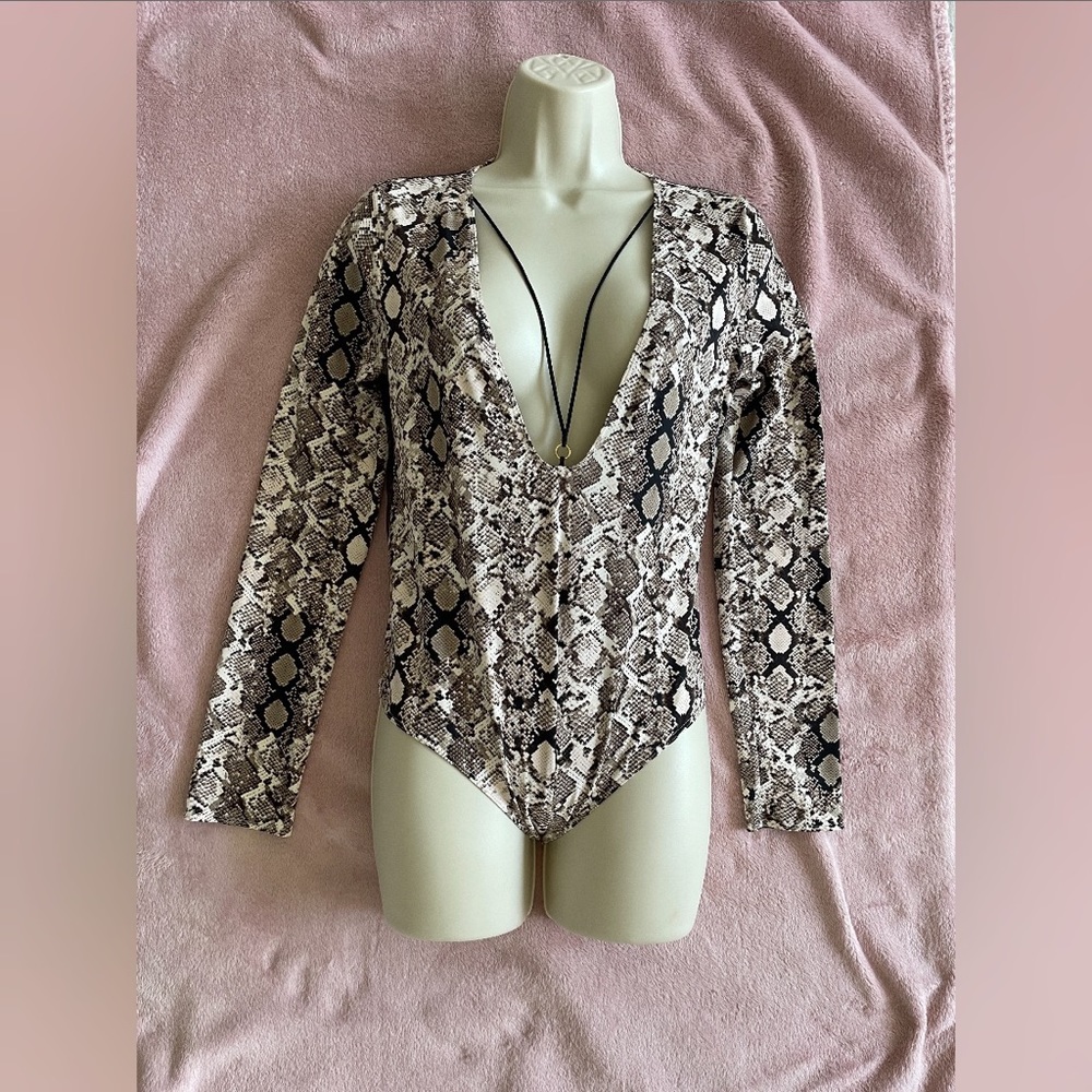 Victoria’s Secret bodysuit. Size M. New